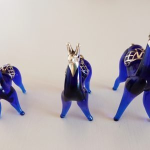 Trio of silver alpaca figurines